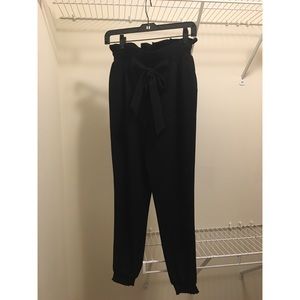 BEBE size XS black fitted harem style pants